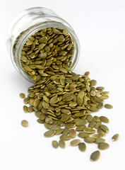 pumpkin seeds on white background.