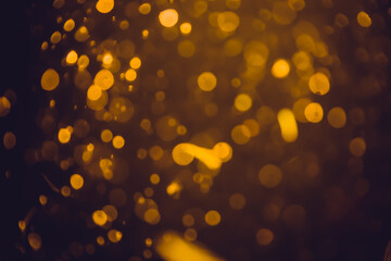 Abstract gold defocus bokeh glitter vintage lights with black