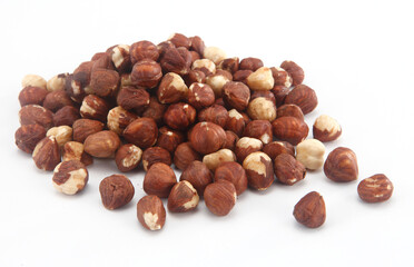 hazelnuts on white background