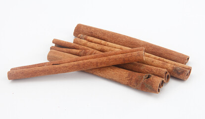 cinnamon sticks isolated on white