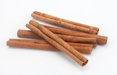 cinnamon sticks isolated on white