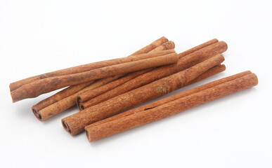 cinnamon sticks isolated on white
