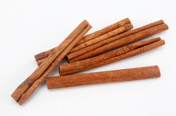 cinnamon sticks isolated on white