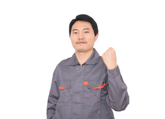 Young worker making a fist and raising his hand to cheer himself up in front of white background