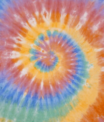 Spiral tie dye background. Swirl tie-dye pattern. Hippie boho circular tiedye wallpaper in yellow blue. - 381540178