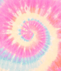 Spiral tie dye pattern. Swirl tie-dye wallpaper. Hippie boho tiedye texture backdrop. Pink yellow rainbow colors.