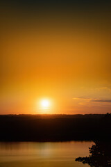 Obraz premium Beautiful sunset on the river in autumn