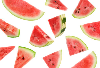 Fresh watermelon pieces falling on white background