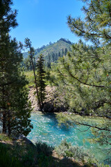 Obraz premium Photo of clear mountain stream racing down the slope in the mountains in western Idaho, USA