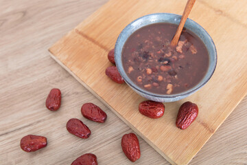 A bowl of traditional Chinese food eight treasure porridge and scattered jujube