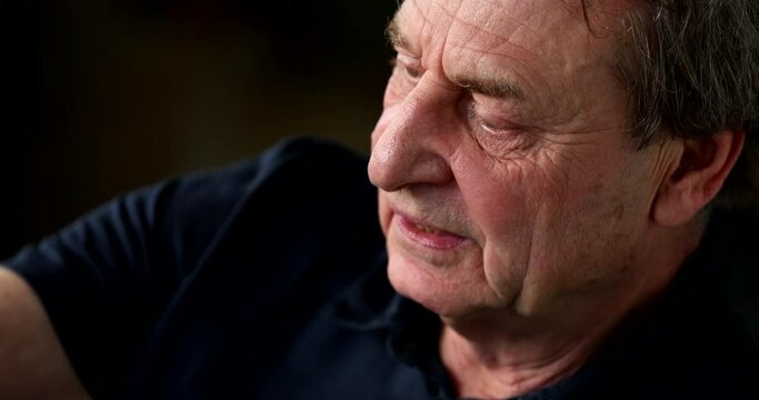 Older Man Taking A Sip Of Coffee Or Tea Close-up Face