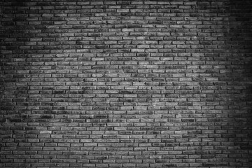 black brick wall background. dark stone texture.