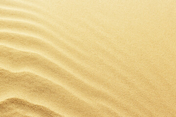 Fototapeta na wymiar Top view on sand dunes. The texture of sand
