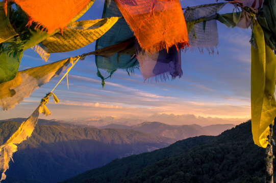 Buddhist Prayer Flags at Tonglu,  Sandaphu, Sandaphu Trek in Winter. Tibetan prayer flag or Lung ta and Kangchenjunga high mountain range West Bengal  