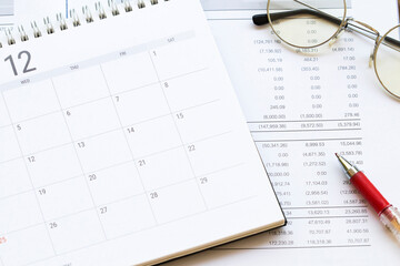 financial statement for check with calendar for business work of personal arrangement flat lay...
