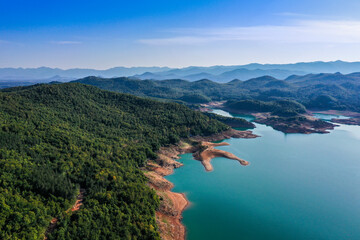 Obraz premium Kruščica lake is the accumulation lake that was built by damming Lika river. It has eighty-meter-high dam and on the bottom of the lake in its depths lies a sunken village and the church of St. Eliah
