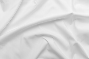 Abstract white fabric texture background. Cloth soft wave. Creases of satin, silk, and cotton.