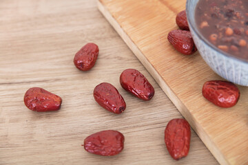 A bowl of Chinese traditional delicacy eight-treasure porridge and scattered jujube