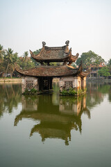 Naklejka premium Floating temple in Thay Pagoda or Chua Thay, one of the oldest Buddhist pagodas in Vietnam, in Quoc Oai district, Hanoi