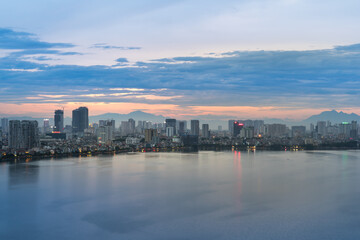 Obraz premium Aerial view of Hanoi skyline at West Lake or Ho Tay. Hanoi cityscape at twilight