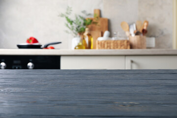 Fototapeta premium Wood table on blur kitchen room background