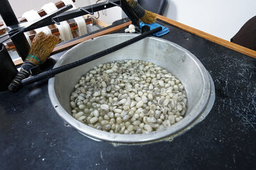 Boiling bowl of silkwarm cocoon prepared for sewing thread and yarn