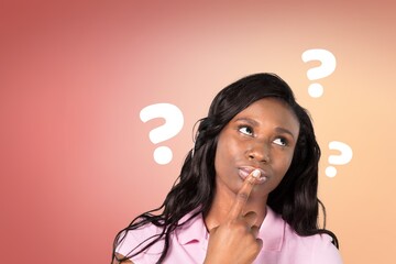 Question sign with a beautiful alarmed woman on pastel background