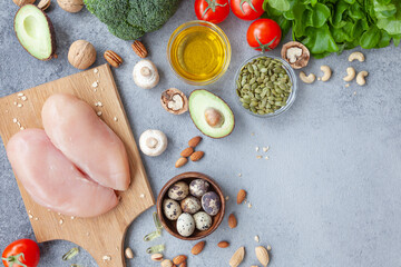 Healthy eating food low carb keto ketogenic diet meal.  Vegetables, meat, nuts and quail eggs. Balanced diet food background.