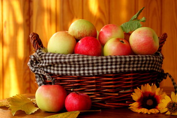Autumn apples in a basket.  Fresh healthy organic  fruit