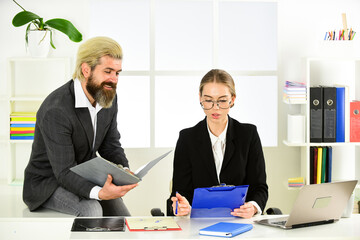 Man and woman boss manager director. Subordination and teamwork. Business report. Colleagues communication. Successful business. Business couple working. Couple work in office. Law consultation