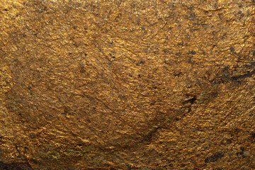 Fake gold yellow texture abstract wall background and gradients shadow shiny