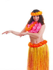 Beautiful young female dancer in traditional Hawaii dress in with orange skirt and flower wreath in...