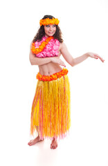 Beautiful young female dancer in traditional Hawaii dress in with orange skirt and flower wreath in her hair in various poses