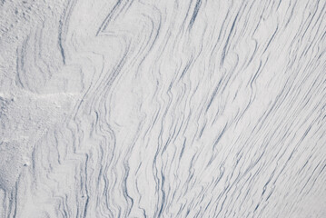 Solid, hard snow texture of an alpine glacier surface. Located in Tirol, Austria... Or maybe it's the Saturn's moon Enceladus?