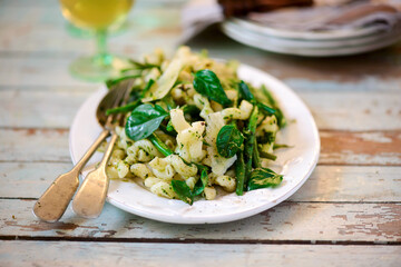 Pasta with green beans, potatoes and pesto. .style rustic