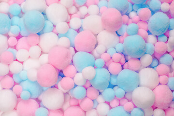 White, pink and blue soft pompons.