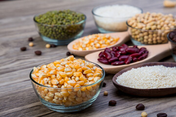 Corn in blow on a wood table background. corn seeds in blow 