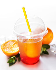 Fresh cocktail with orange and ice