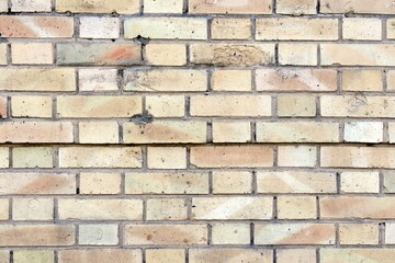 Wall made up of faded colored bricks looking stunning in rectangular pattern