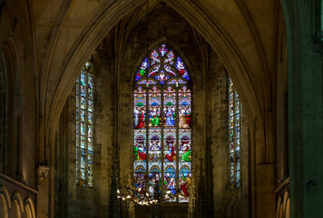  Stained glass window at the Collegiale church of Saint Emilion, France