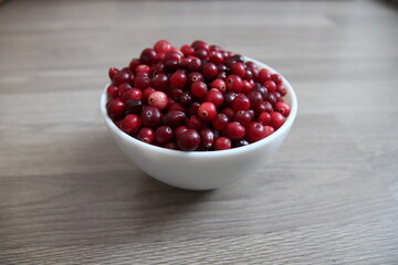 
red cranberries in a white plate