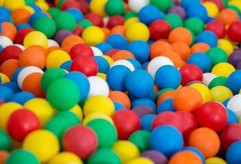 Fototapeta na wymiar Many colorful toy ball in heap