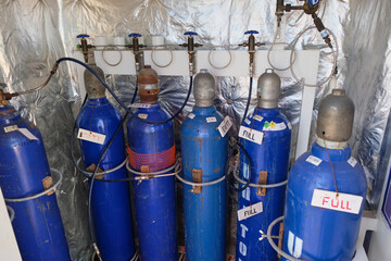 Oxygen cylinders into cargo ship accommodation store