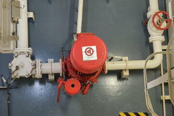 View of emergency fire pump on board of cargo ship