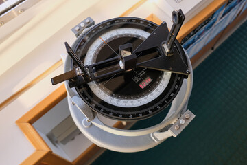 Gyro compass located on navigation bridge of cargo ship