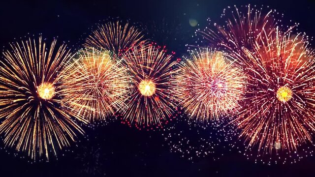 4K Beautiful Multi colored Fireworks in Night sky. New year's Fireworks Show Explosions Celebration. Bokeh Lights. Happy Birthday, Wedding, Anniversary, Confetti, Diwali, Christmas, Holiday, Event.