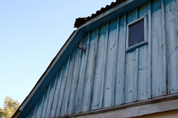 Searchlight on the roof of an old village house