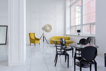 modern fashionable futuristic interior design of a spacious white hall with black and yellow furniture
