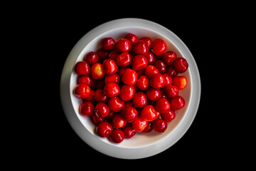  red cherries on a black background