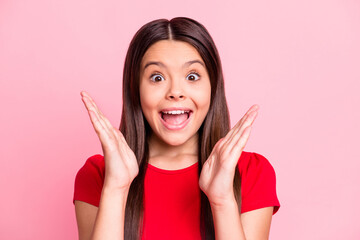 Photo of sweet cute excited little lady long hairstyle open mouth toothy smile raise hands arms...
